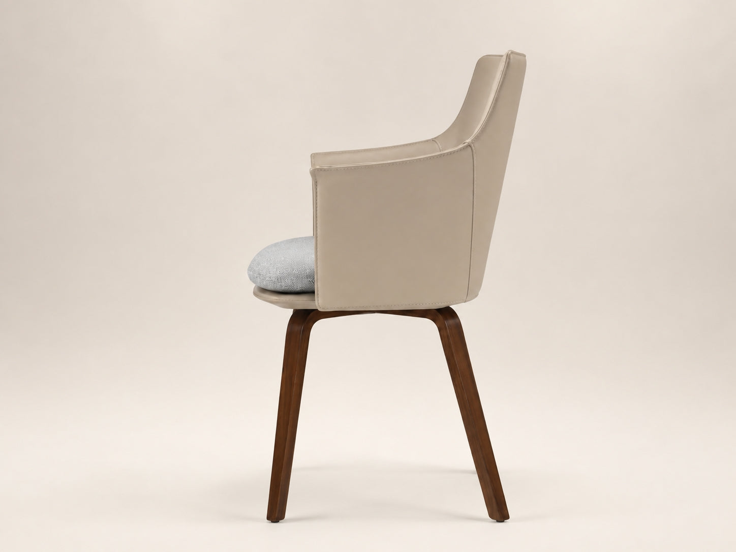 Briancon Plywood Dining Chair with a distinctive walnut plywood base and sculptural modern elegance