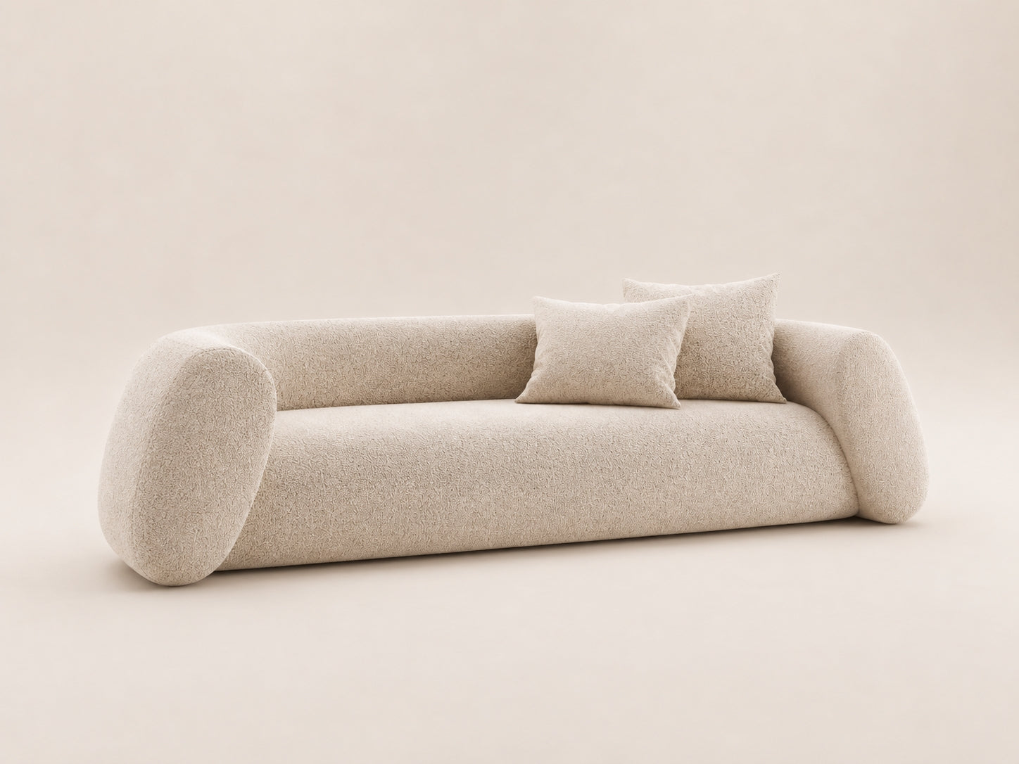 Cascade curved sofa with rounded seat forms, plush high-density foam cushions and a clean architectural profile