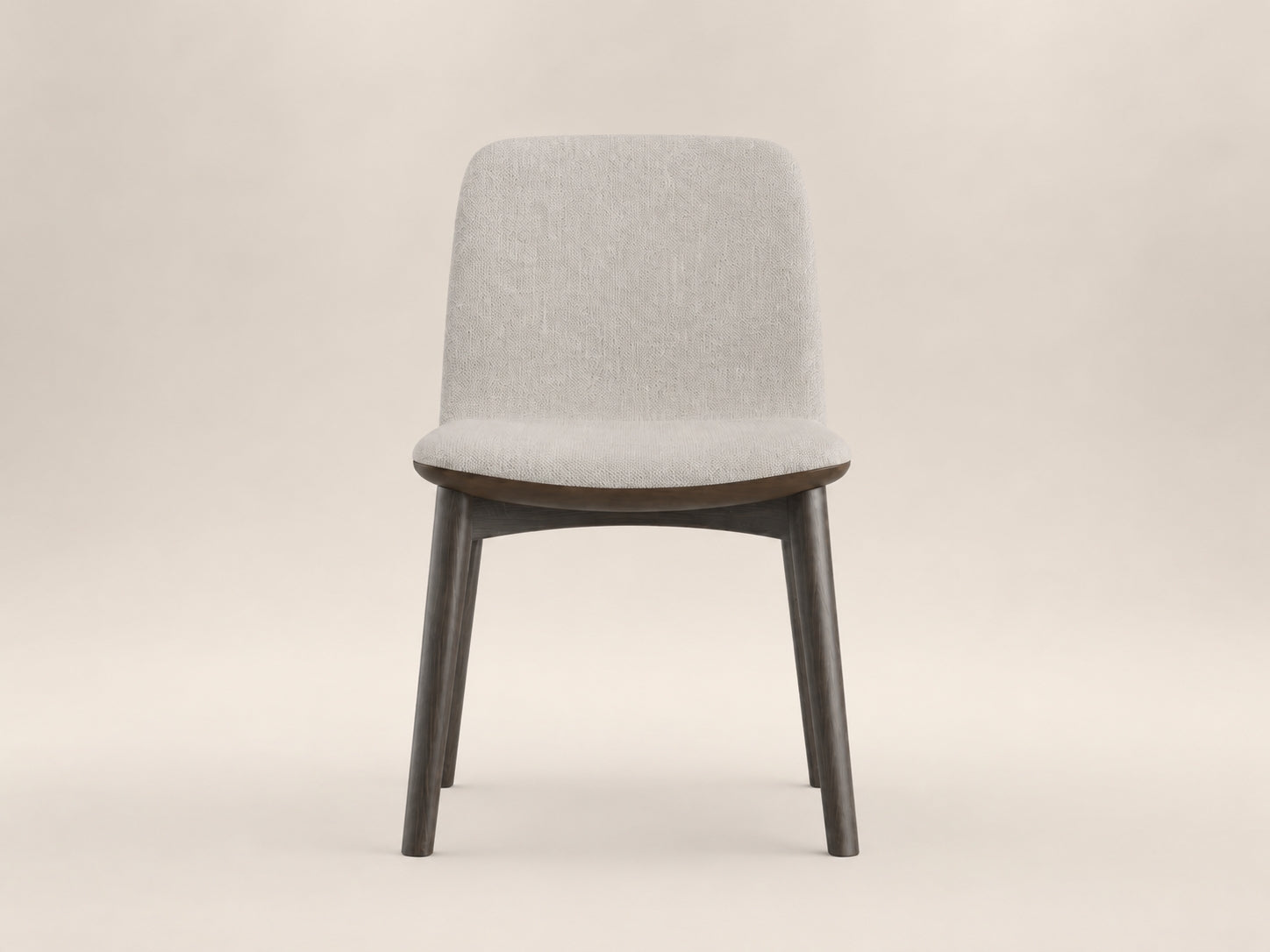 Cascade Dining Chair by Canapy Furniture featuring a sleek silhouette, gently curved backrest and contoured seat