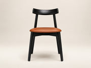 Florence Chair by Canapy Furniture featuring an upholstered seat, wood-finished legs and contemporary design