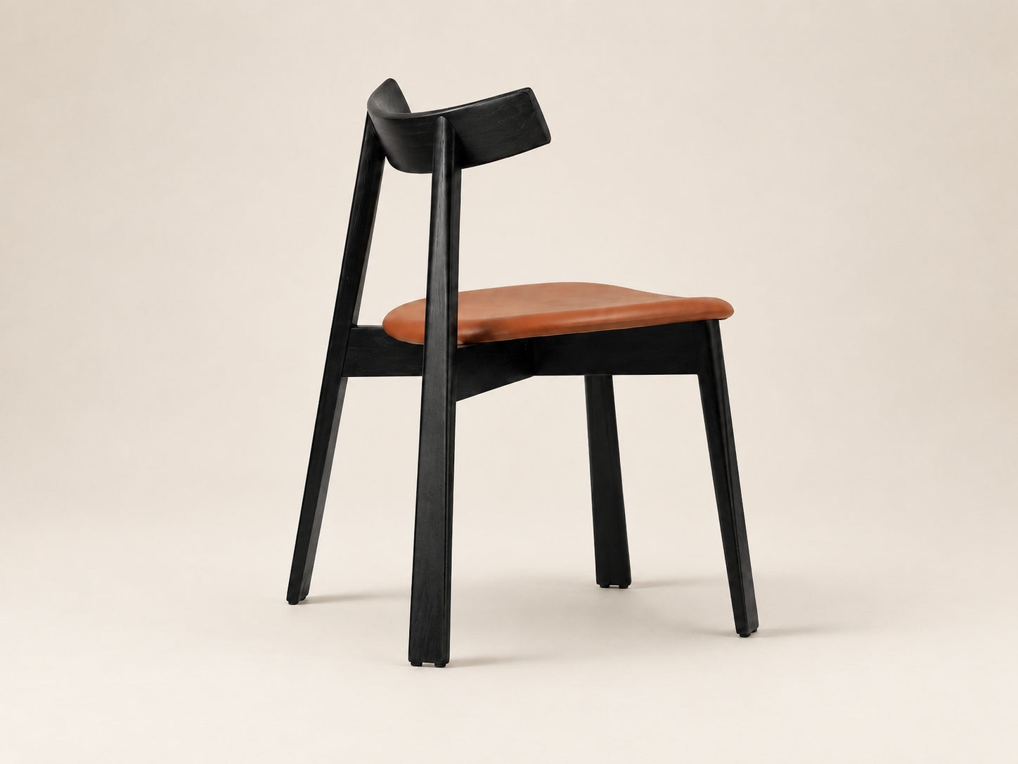 Florence contemporary chair with a refined upholstered seat and wooden legs for residential or commercial interiors