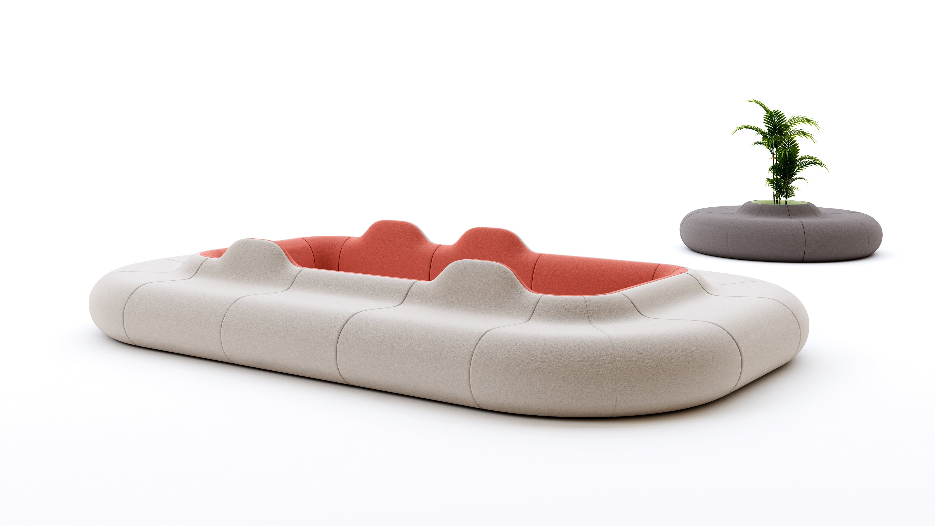 Modern outdoor sofa with red cushions and a small plant on a white background