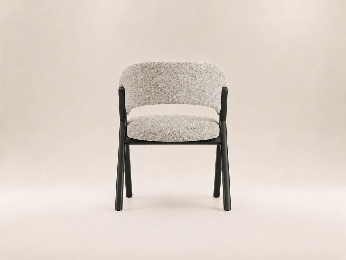 Koza elegant dining chair with refined proportions and timeless style for modern interiors