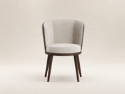 Lupa Dining Chair by Canapy Furniture featuring a rounded backrest, tailored upholstery and elegant modern comfort
