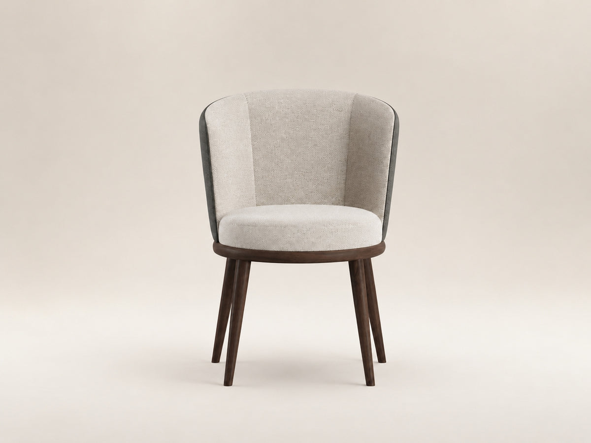 Lupa Dining Chair by Canapy Furniture featuring a rounded backrest, tailored upholstery and elegant modern comfort