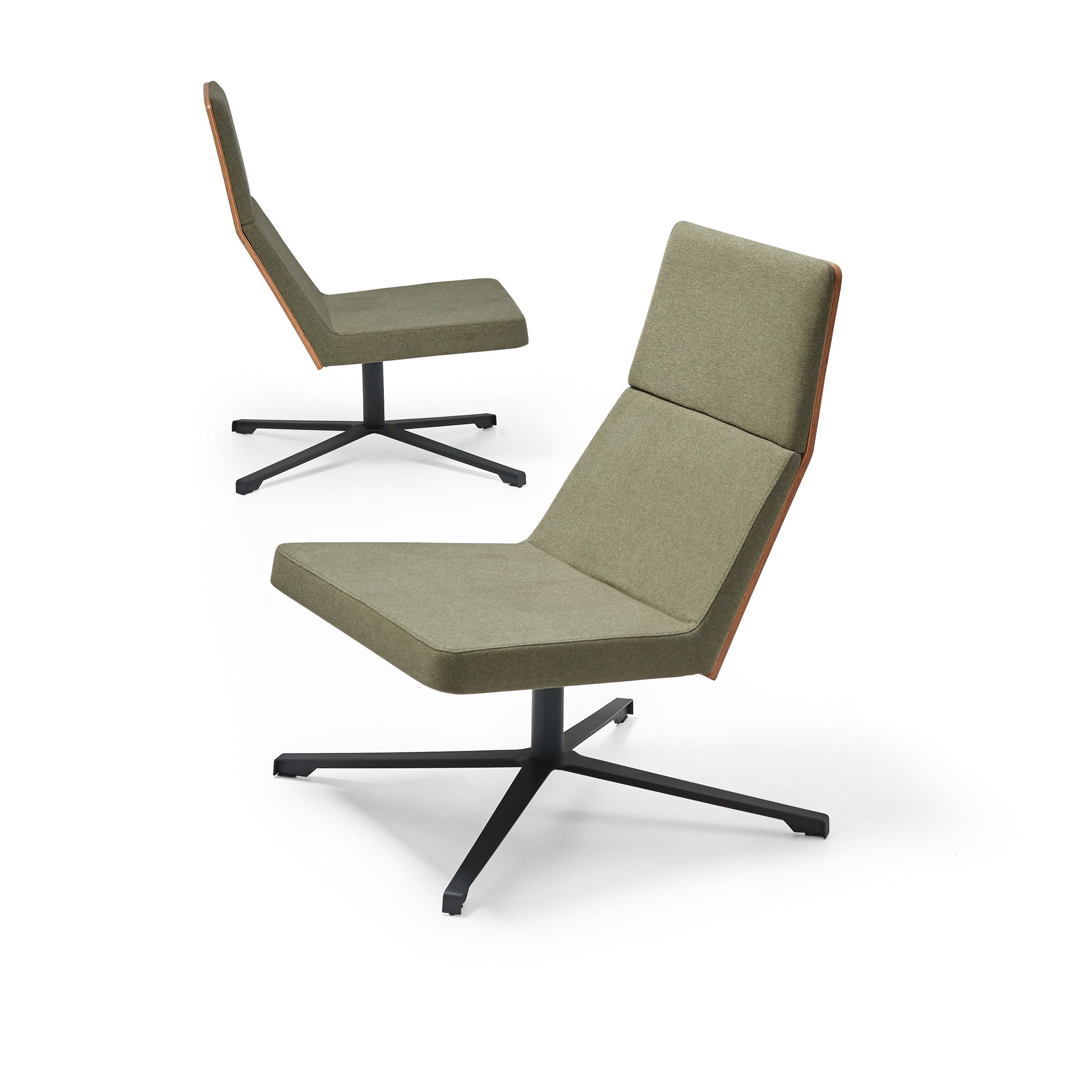 Modern green chair with black metal base on a white background