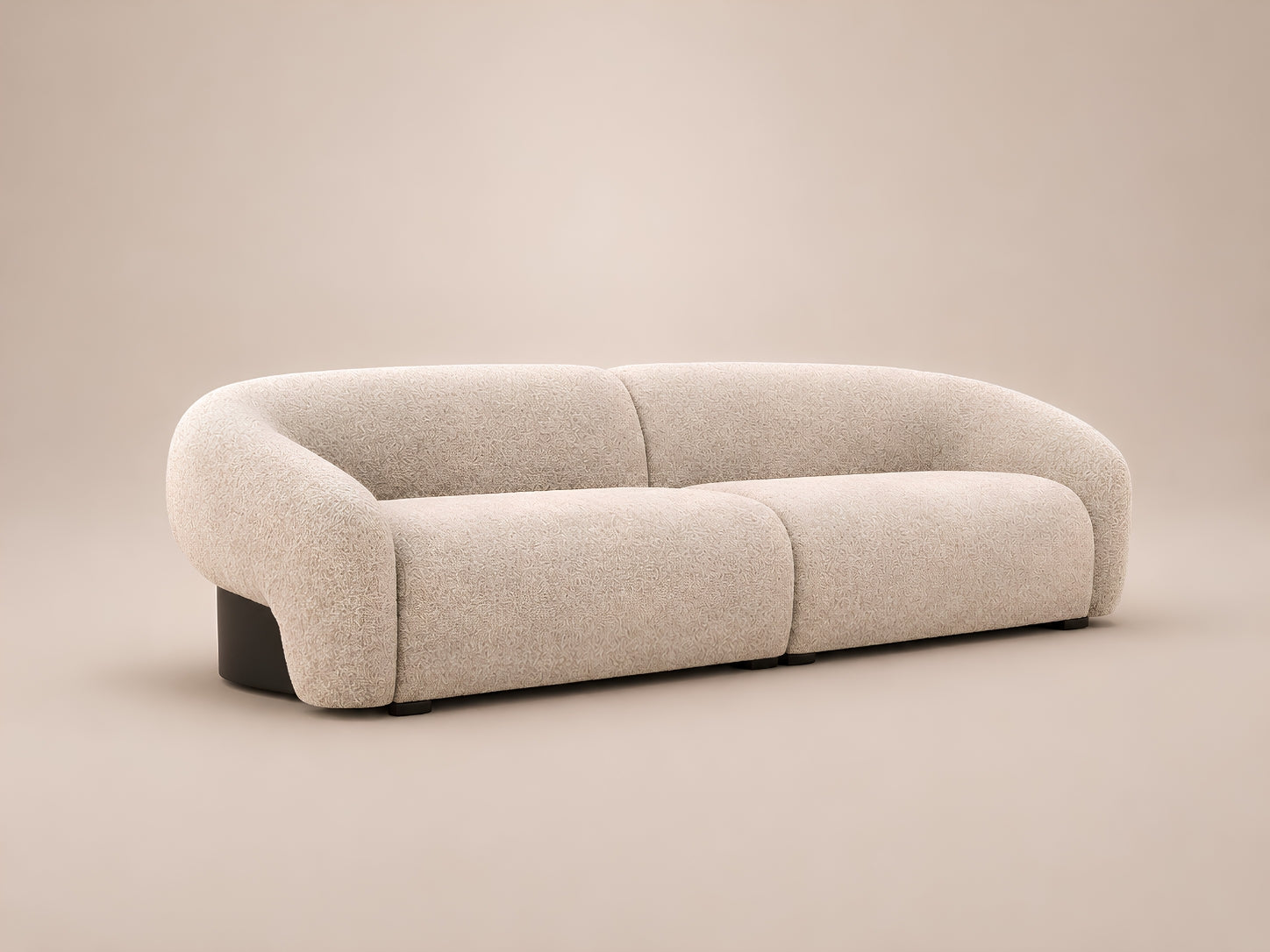 Opal low-profile sofa with gently curved back, soft cushions and sculptural comfort for modern interiors