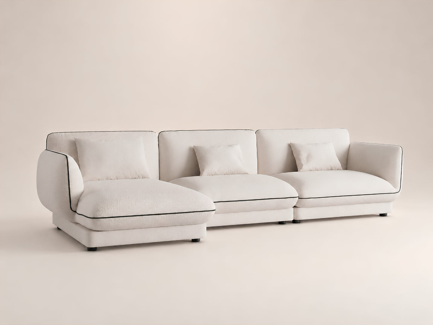 Orbid Plus customizable modular sofa featuring plush cushions, refined piping details and flexible seating configuration