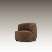 Orren Armchair in brown velvet fabric with curved back