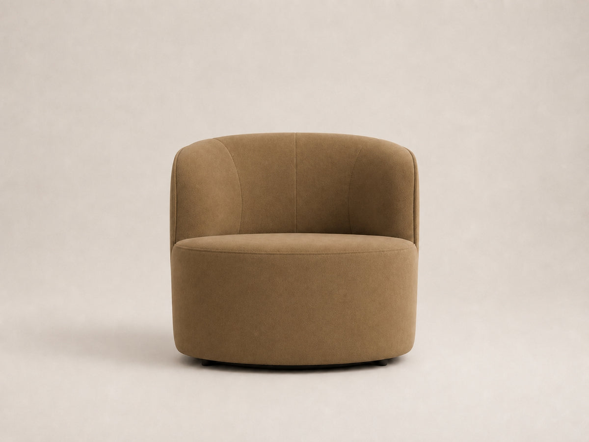Orren Armchair by Canapy Furniture featuring plush fabric, gentle curves and a low-slung modern silhouette