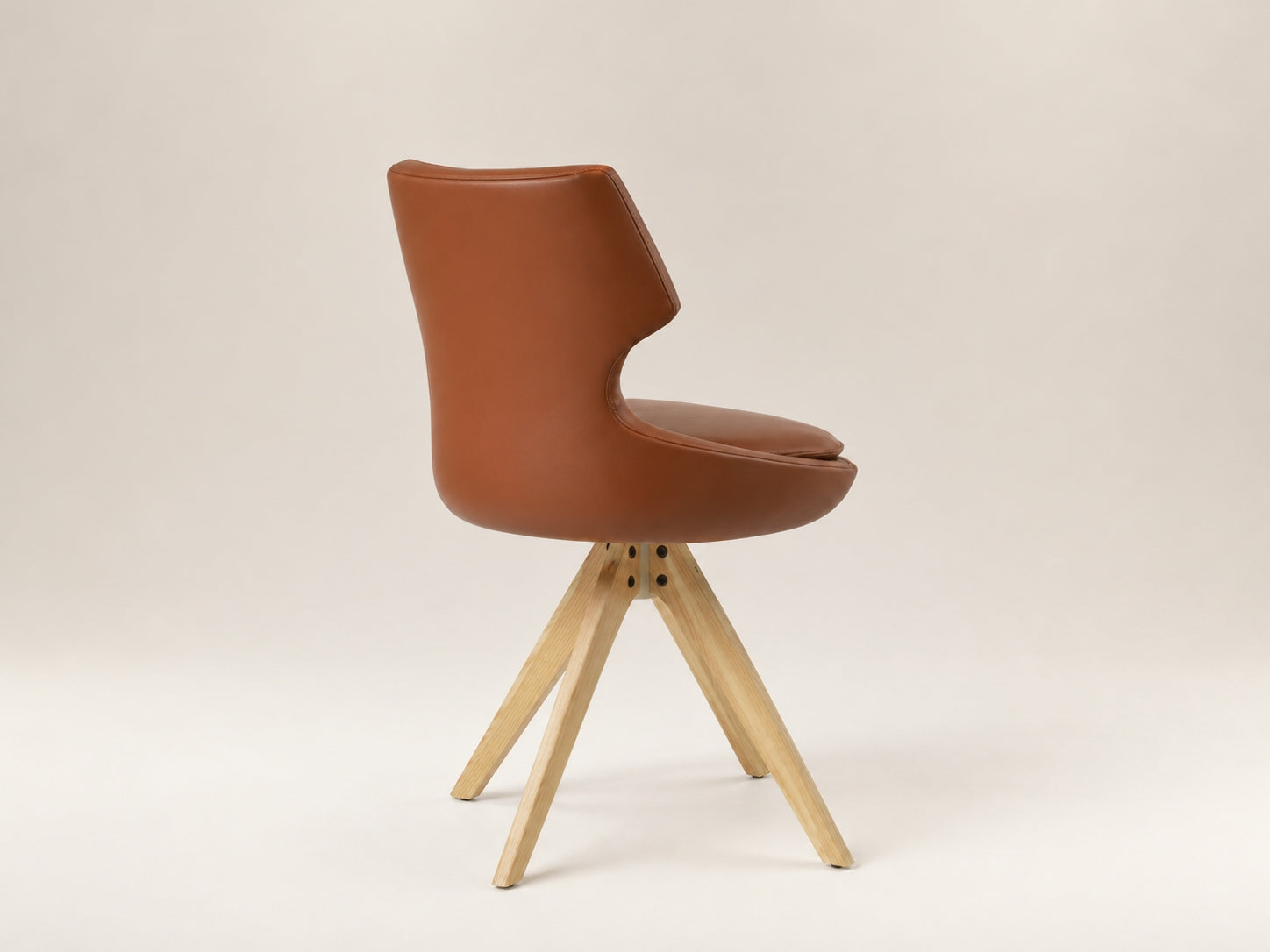 Patara Pyramid modern swivel dining chair with S shape spring support, upholstered comfort and residential design