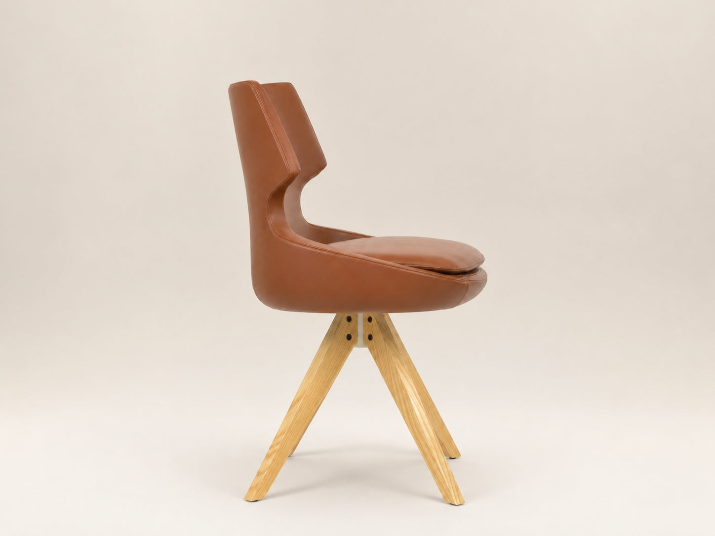 Patara Pyramid upholstered swivel chair with a removable padded seat cushion and comfortable backrest