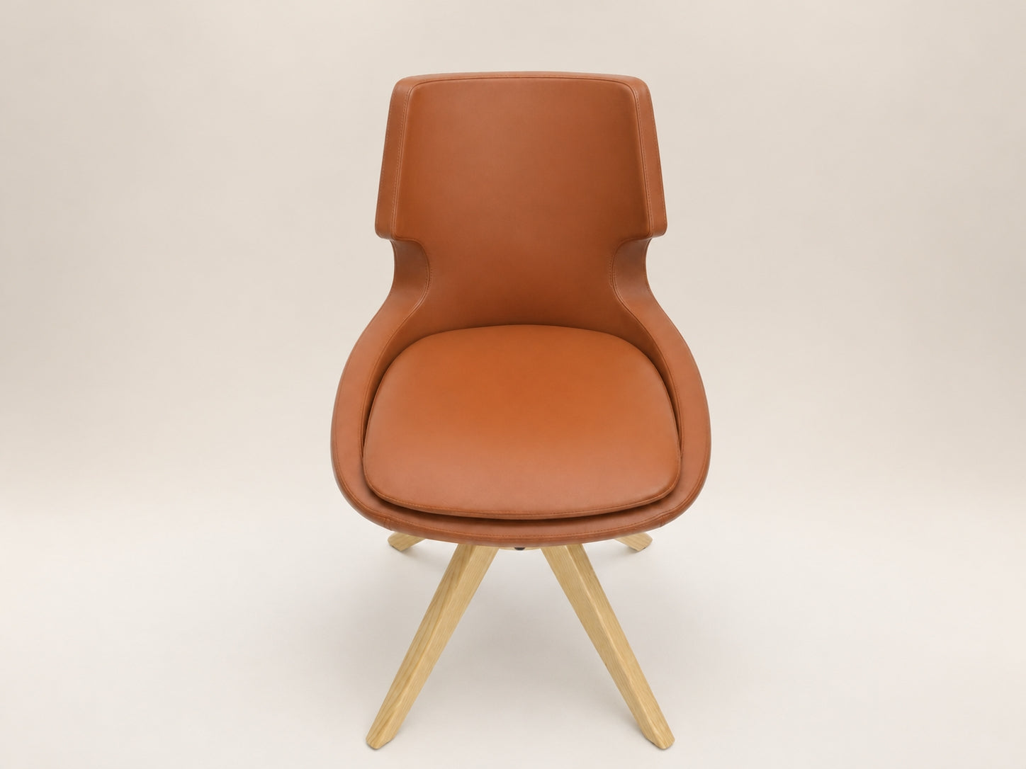 Patara Pyramid dining chair with swivel wood legs, adjustable pod feet and refined modern comfort