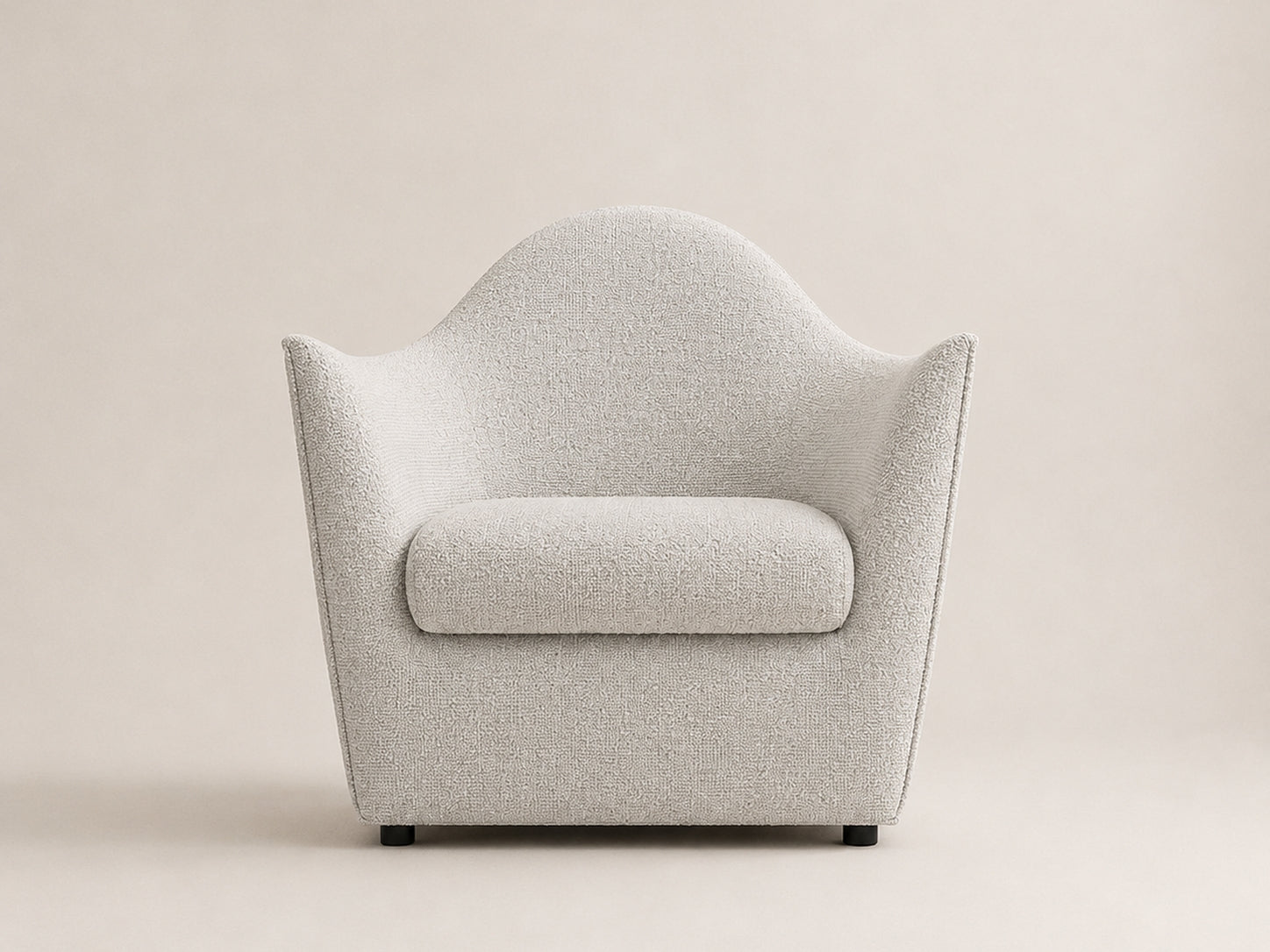 Serene Armchair by Canapy Furniture featuring a gently sloping backrest, graceful arms and sculptural modern comfort