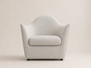 Serene Armchair by Canapy Furniture featuring a gently sloping backrest, graceful arms and sculptural modern comfort