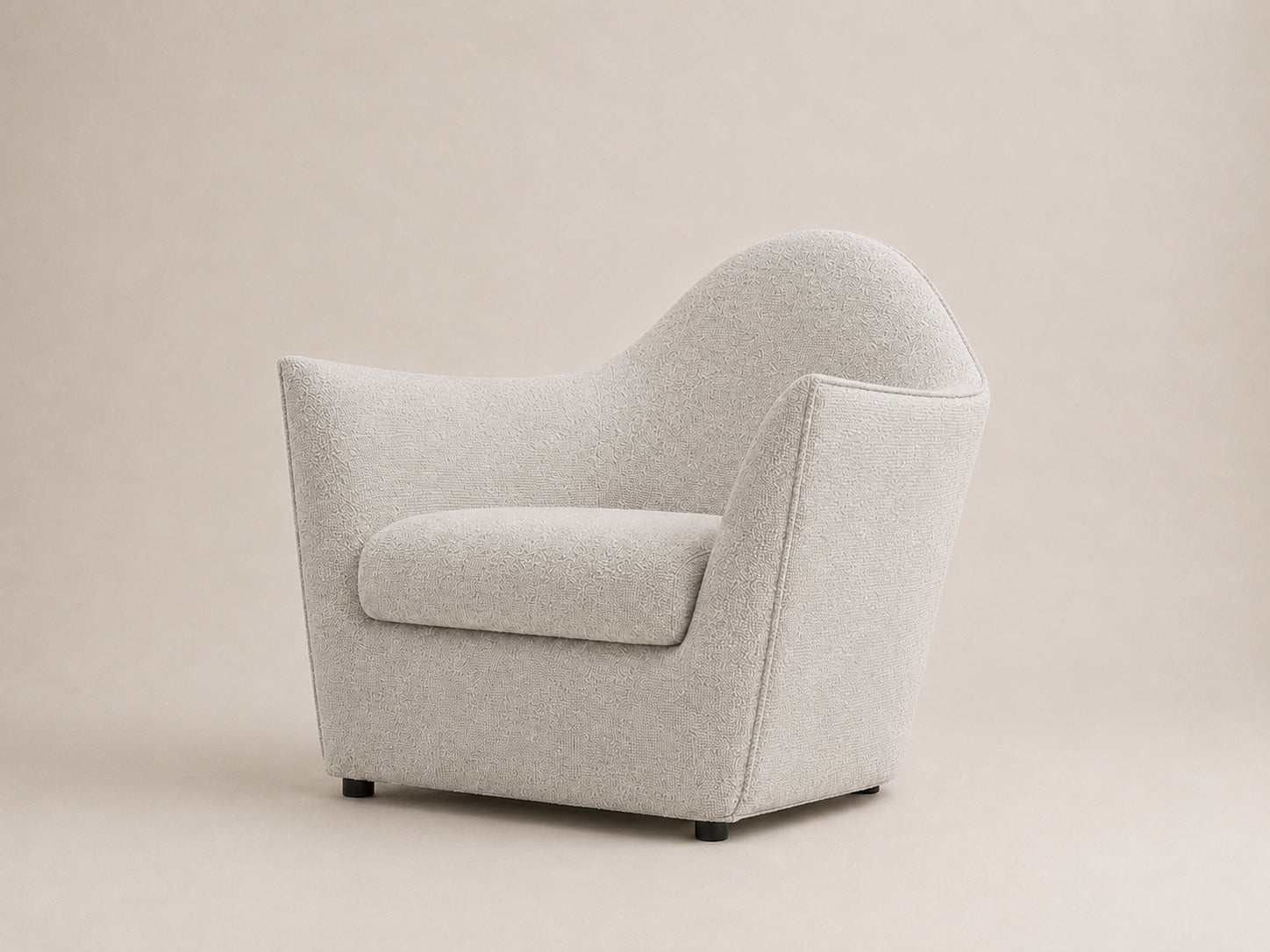 Serene modern lounge chair with a wide supportive seat, soft curves and customizable upholstery for refined interiors