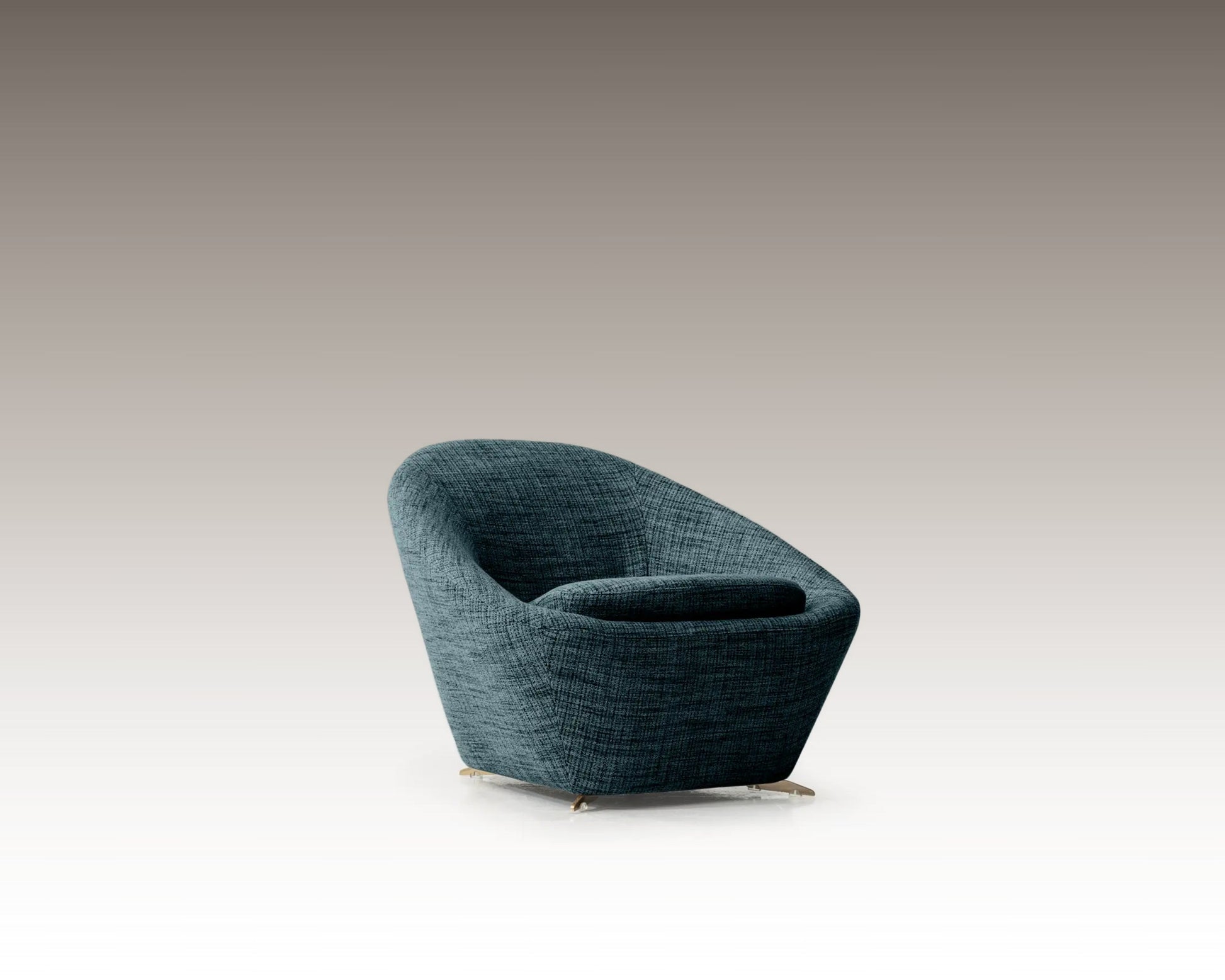 Tao Armchair in textured blue fabric, angled view