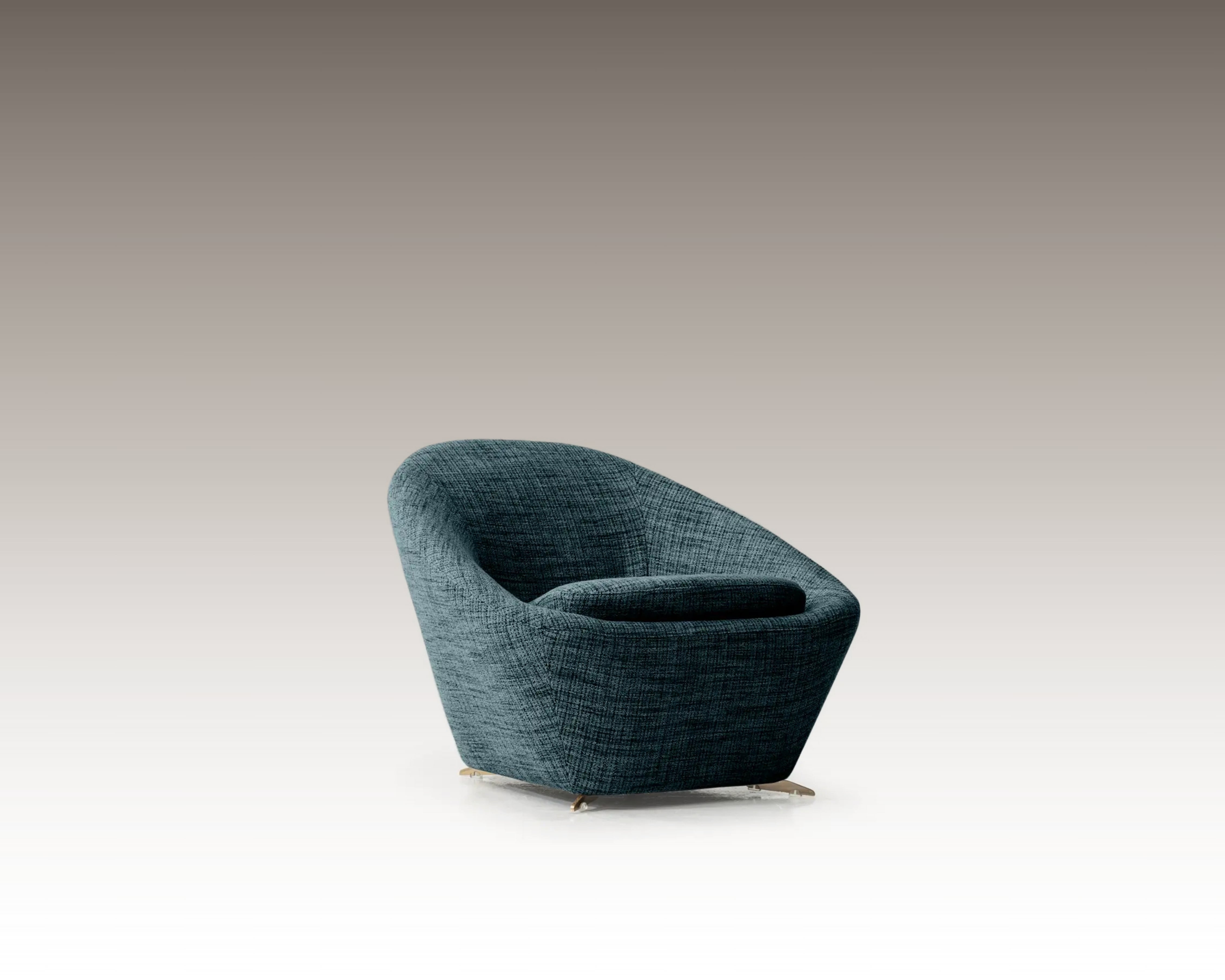 Tao Armchair in textured blue fabric, angled view