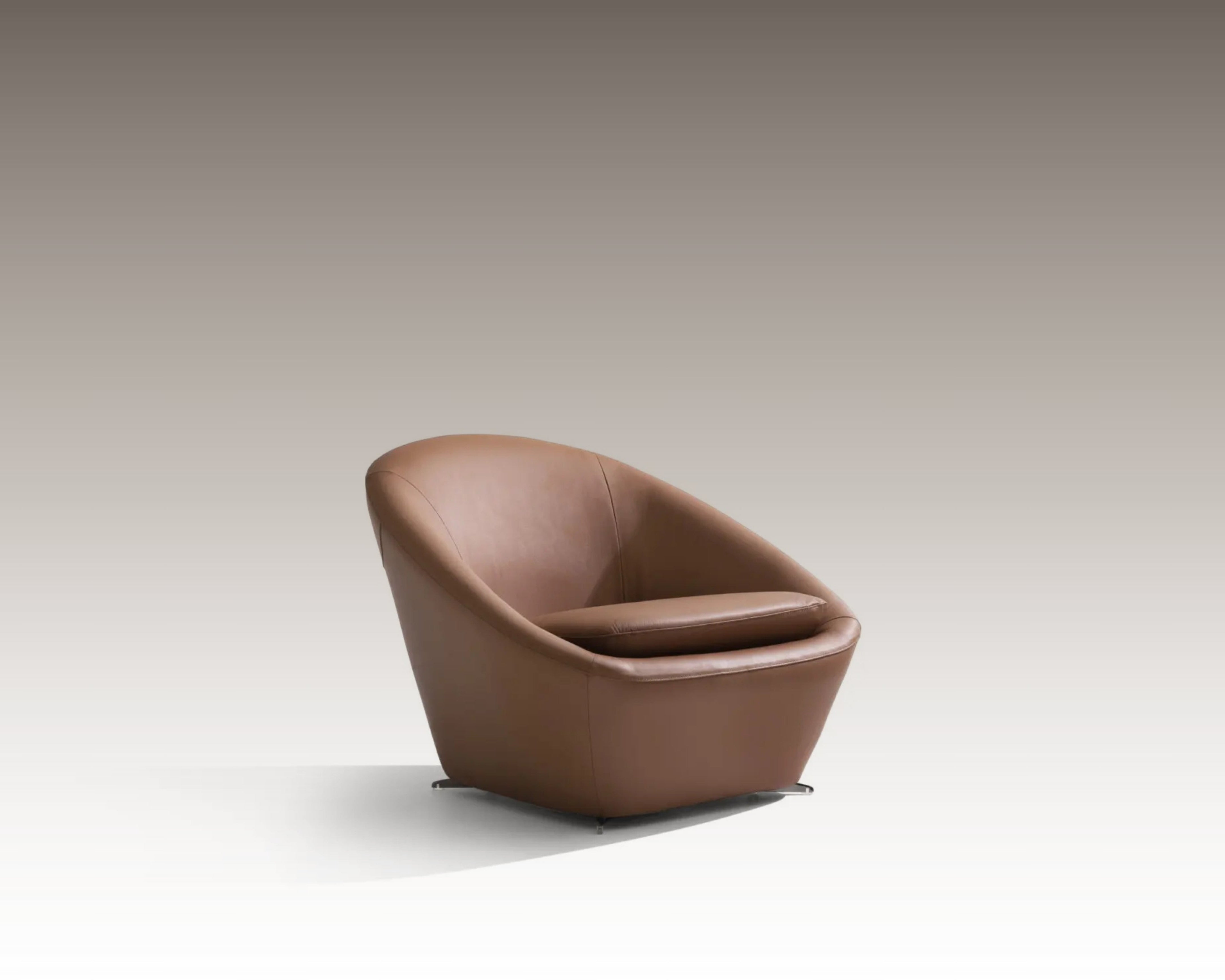 Tao Armchair in brown leather, side angle