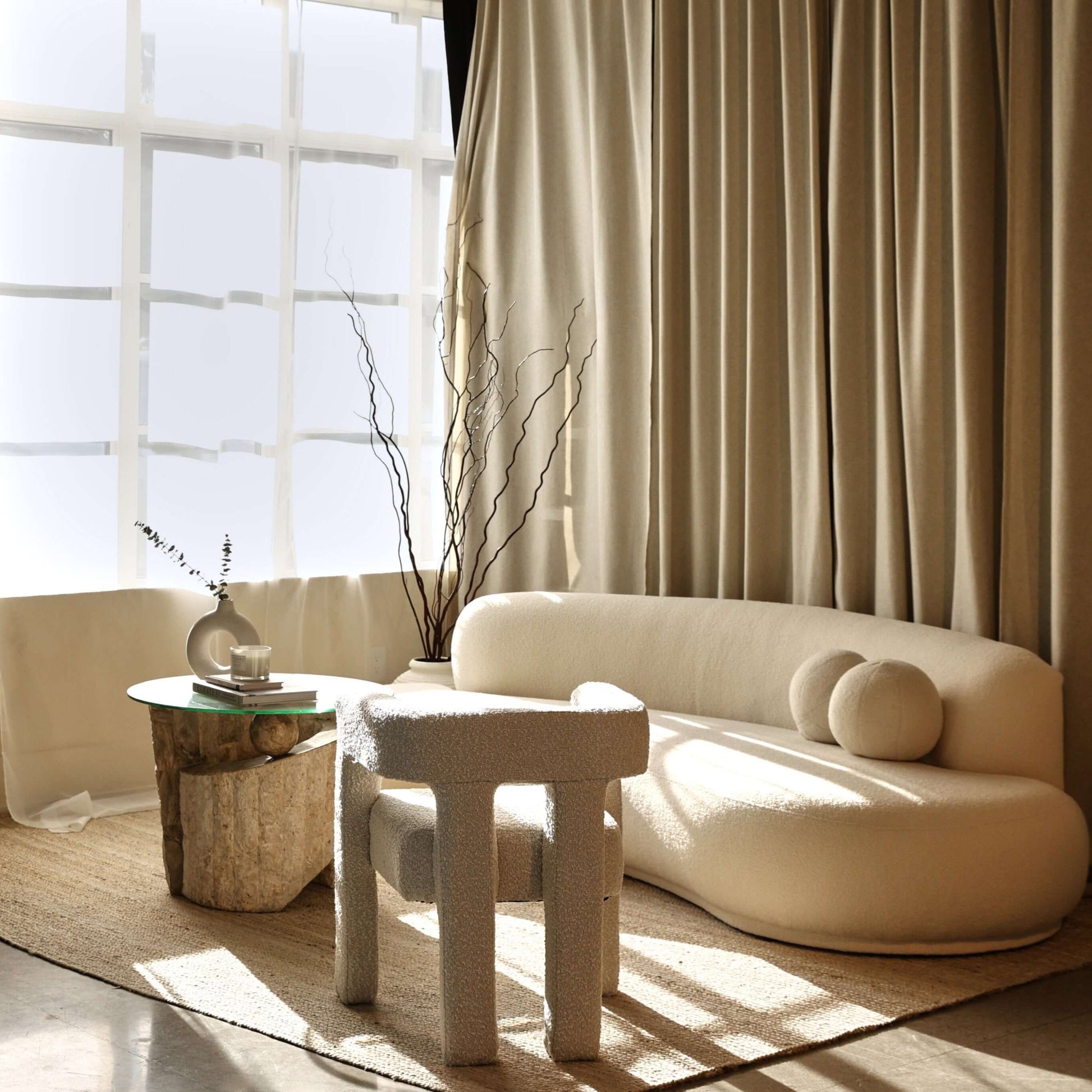Teddy Sofa in a contemporary living room with sculptural curved design