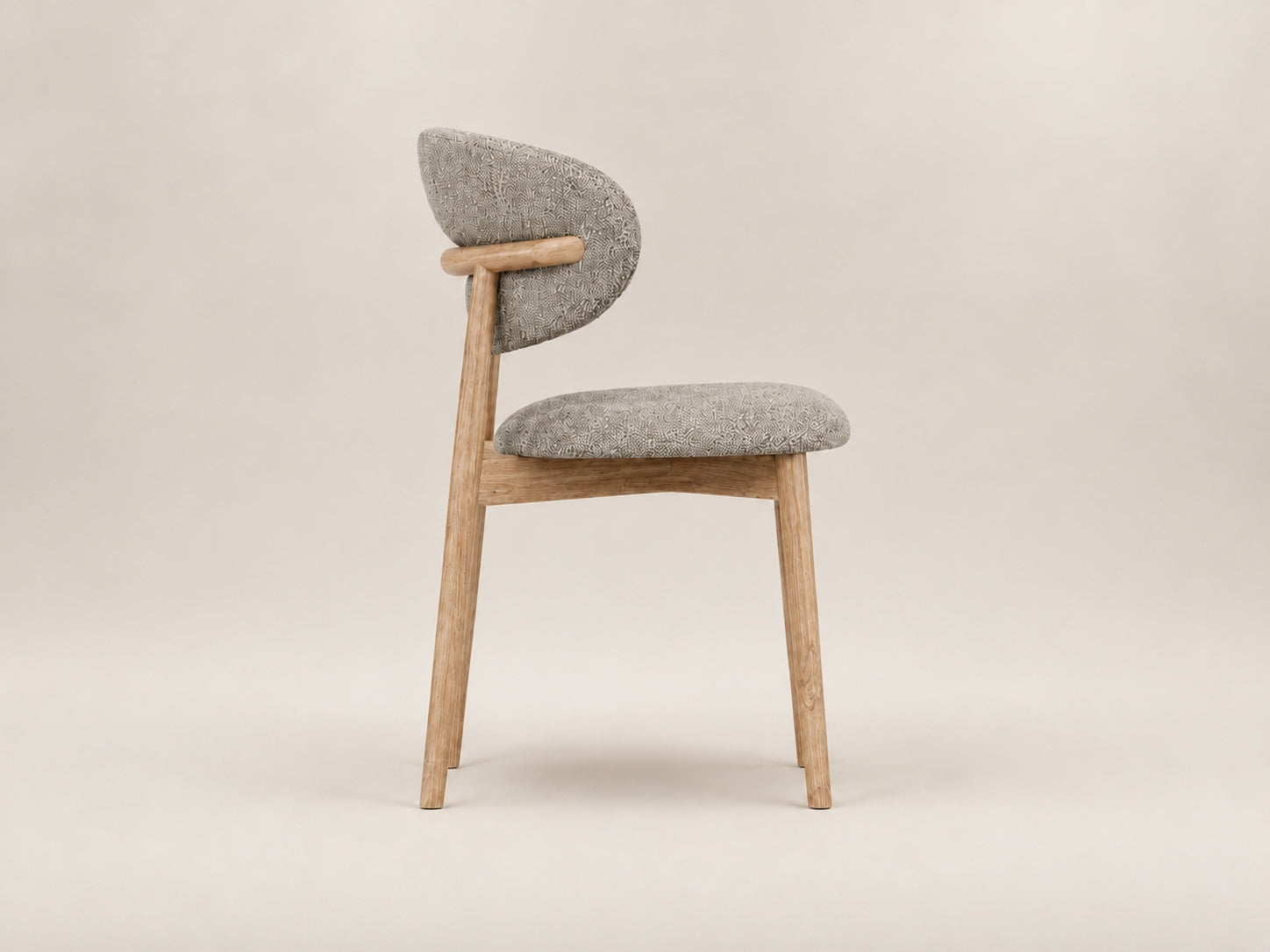 Tierre modern oak dining chair with natural oak base, soft upholstery and Scandinavian-inspired design