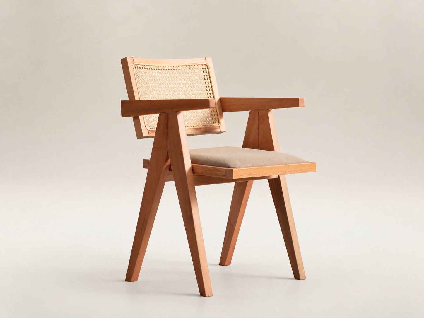 Tuscany wood and cane dining chair with a natural oak finish, breathable backrest and refined modern craftsmanship
