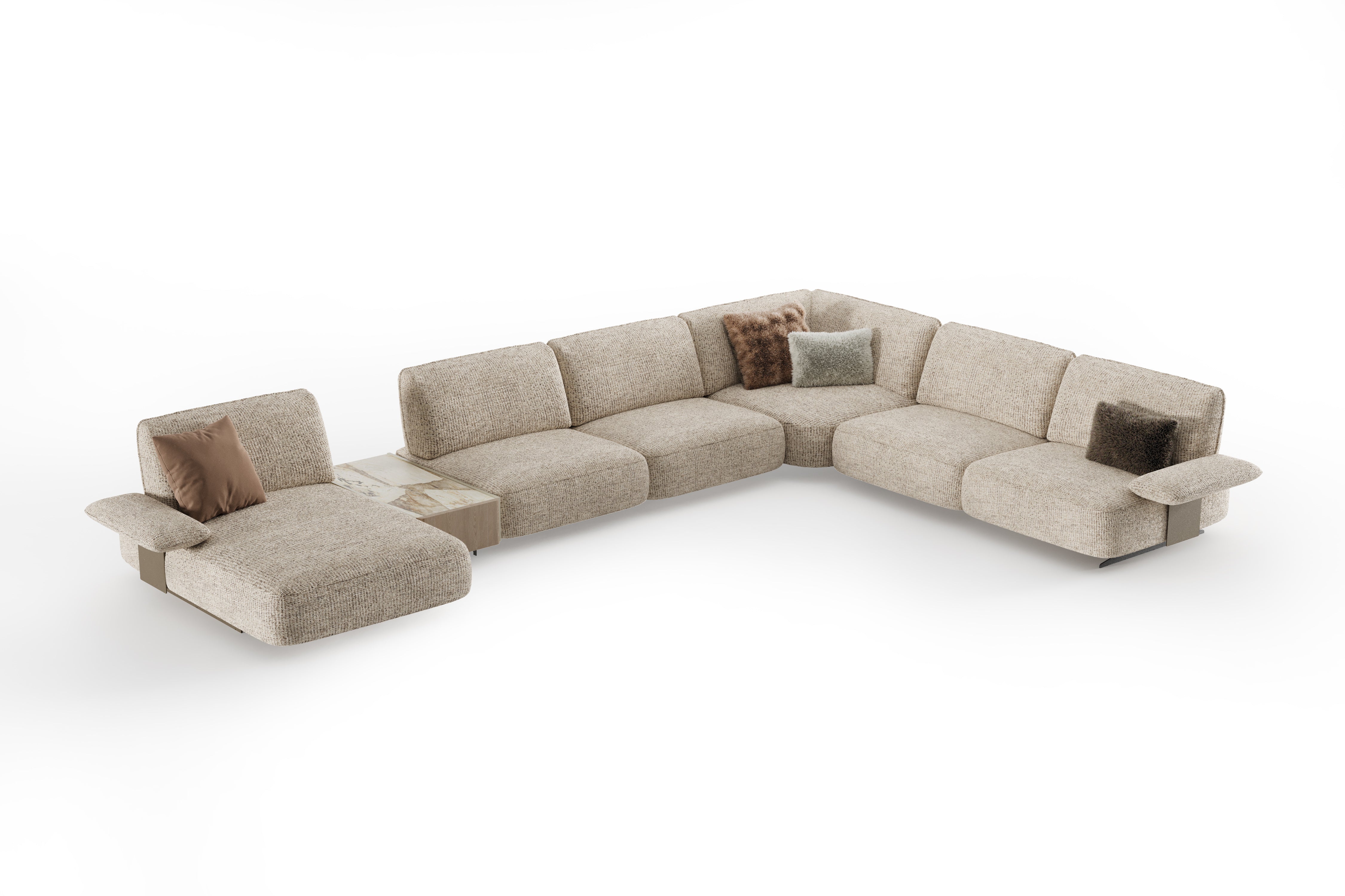 Beige sectional sofa with brown cushions on a white background
