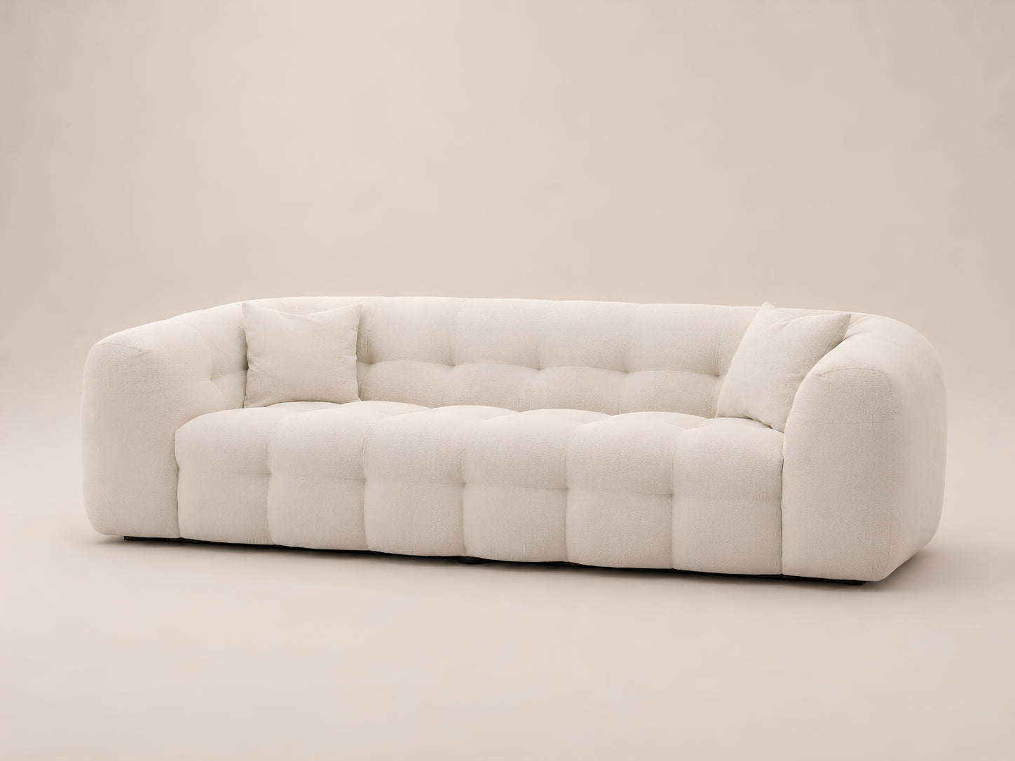 Viva Sofa with deep-set cushions, refined grid stitching and customizable modular design for contemporary loft interiors
