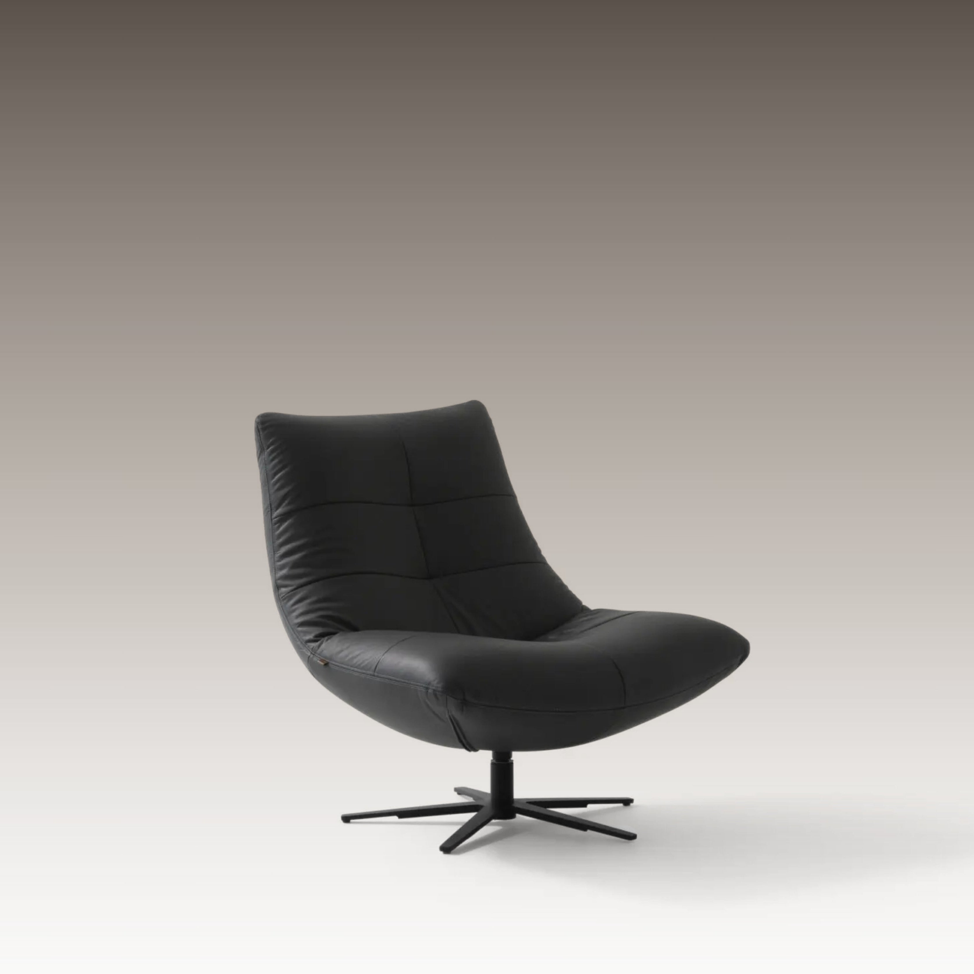 Zen Resting Chair shown at an angle with dark fabric on light background