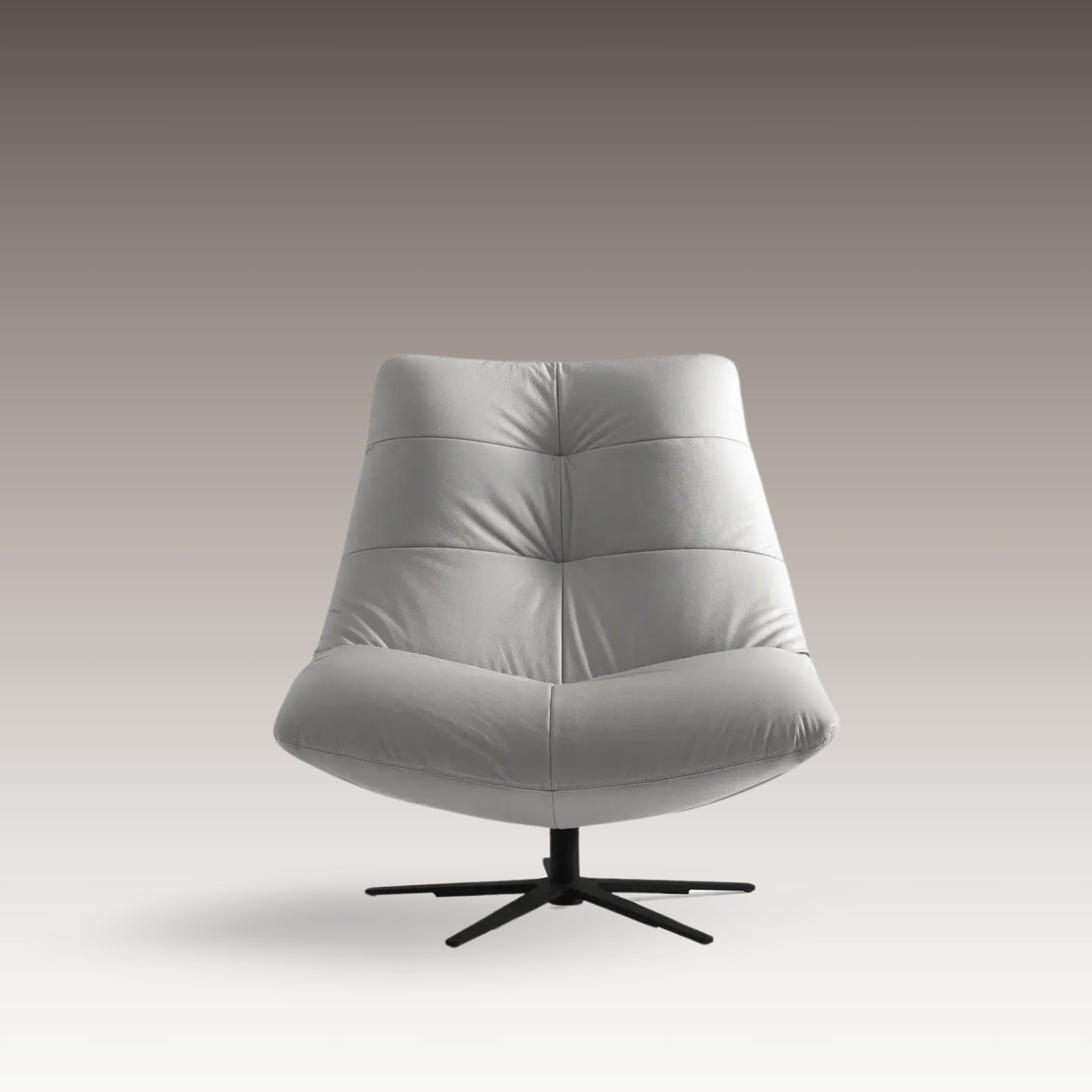 Front view of the Zen Resting Chair in light grey leather-nubuck fabric with pouf